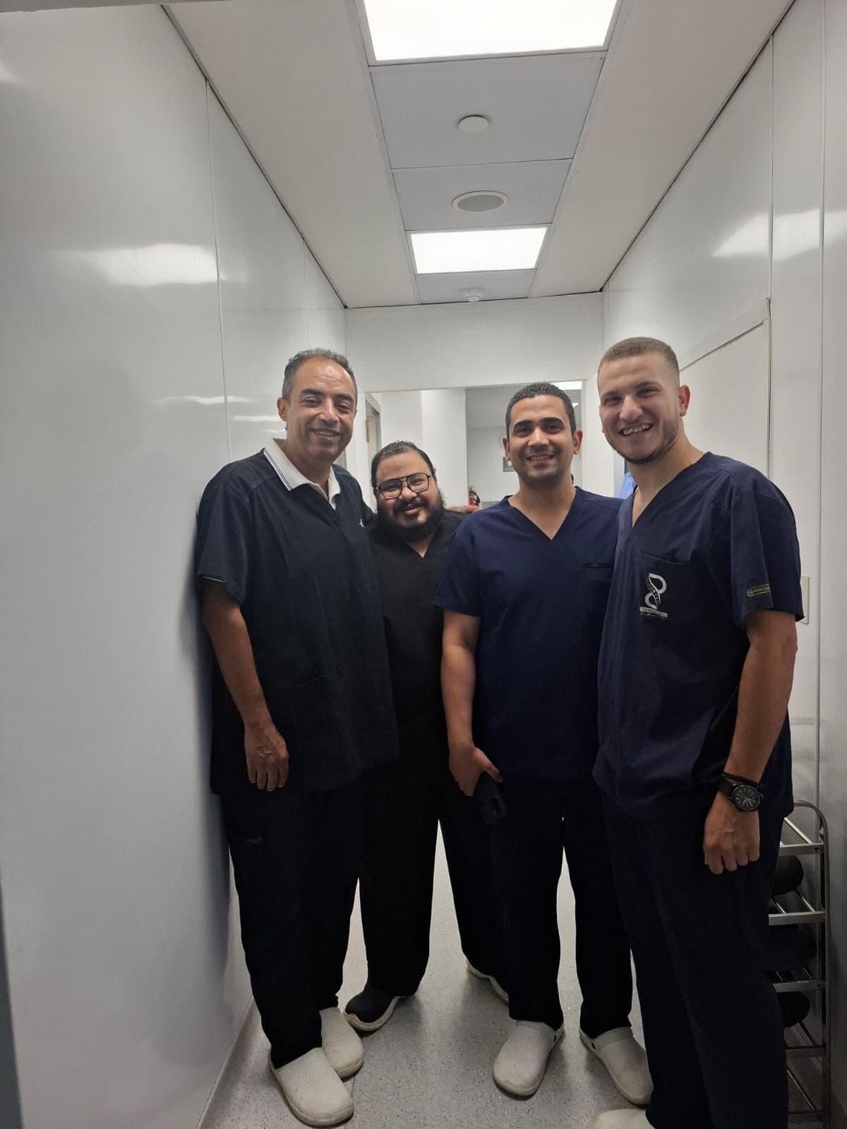 With colleagues between cases